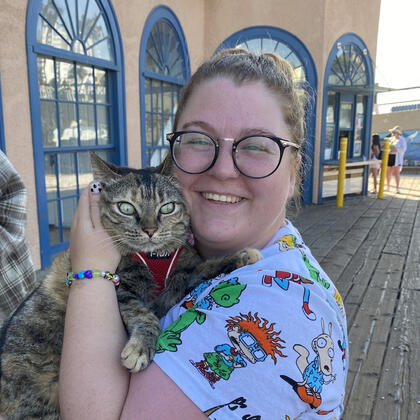 Madison (right), pictured with popular California street artist (left)